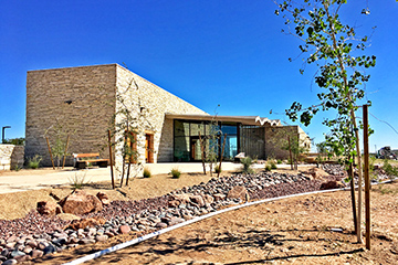 View of the new Pecos County Safety Rest Area from a landscaped dry creek
