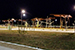 View of the a playground and picnic arbors at night