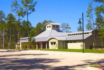 View of new facility, nested among pine trees
