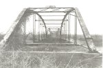 Historic black and white photograph of bridge