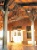 Timber and brick material recalls local tomato shed structures